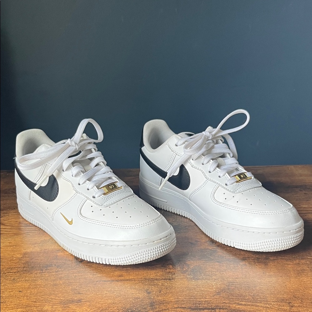 Nike Air Force 1 Low ‘07 Essential | White and Black with Gold